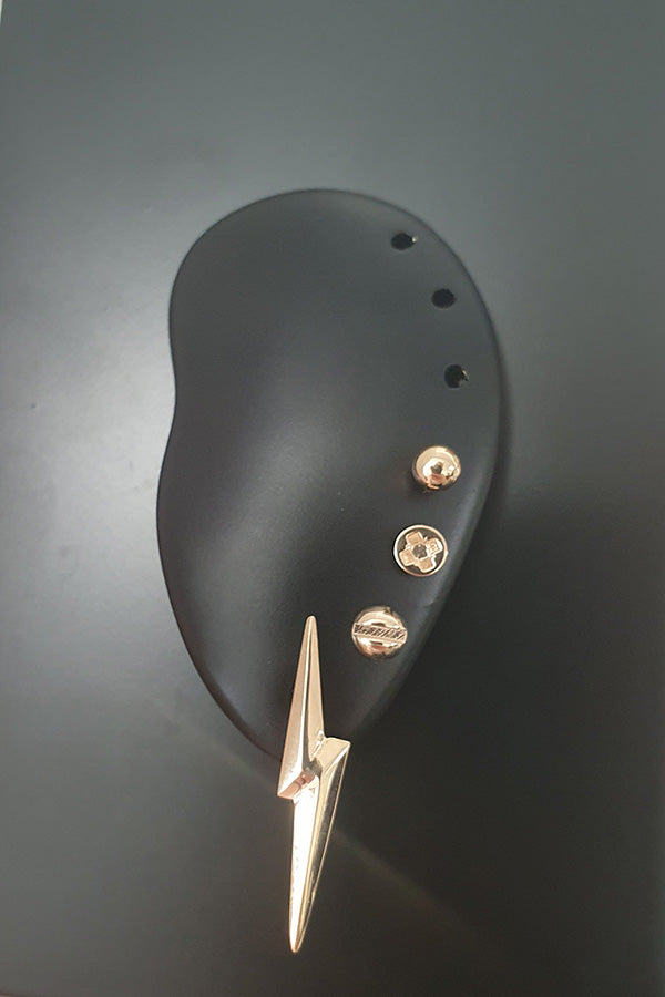 14ct gold 3D Pointed Lightning Bolt Earrings, Mini Flat-head, Cross-head screw earrings and 4mm gold ball ear stack on a black magnetic ear