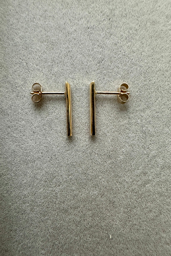 A pair of Edge Only 9 carat gold D Bar Earrings. Side view. 100% recycled gold
