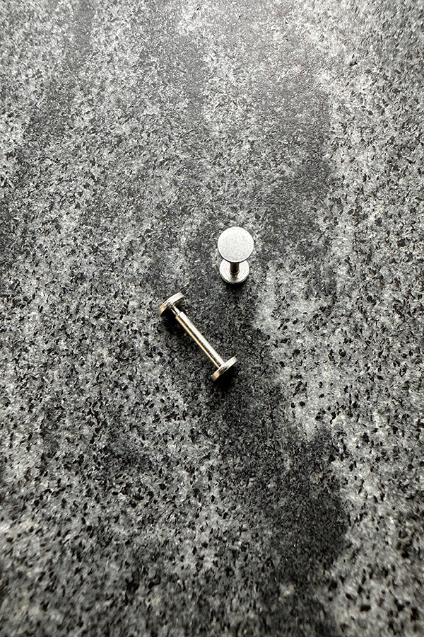 Circle Labret earrings 3mm sterling silver on marble