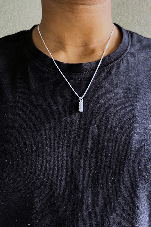 Edge Only Diamond Cut Cyclinder Pendant in recycled sterling silver box chain.