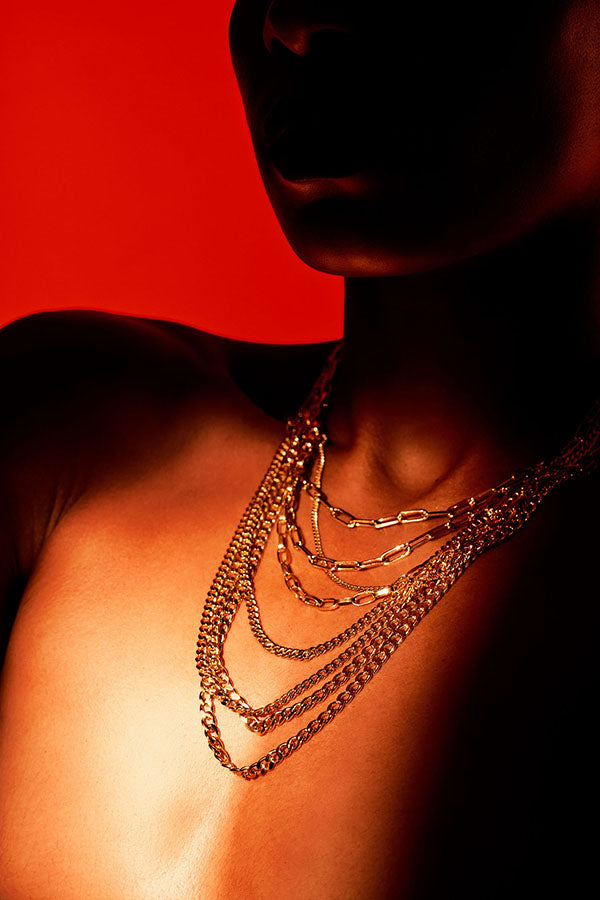 Edge Only Heavy Curb Chain in sterling silver layered with other necklaces and pendants