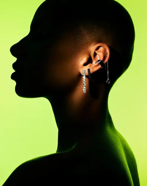 Model wearing sterling silver Edge Only Rugged Bar Earrings, bar earrings and square ear cuff earrings