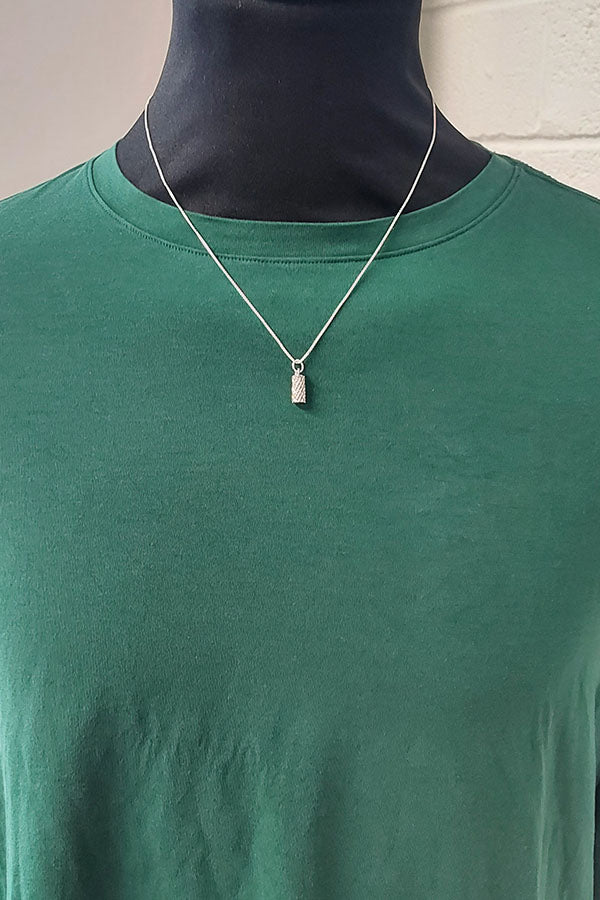 Edge Only Diamond Cut Cyclinder Pendant in recycled sterling silver box chain.