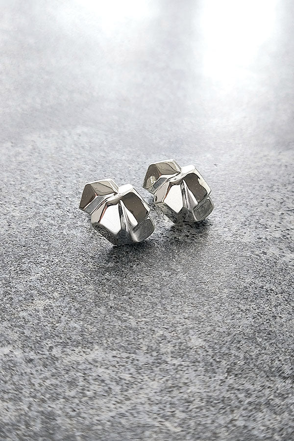 Edge Only Rock Earrings in recycled sterling silver. on marble