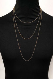 Mannequin shows the 1.8mm Belcher Chains in the 45, 60, and 80cm lengths in gold vermeil.