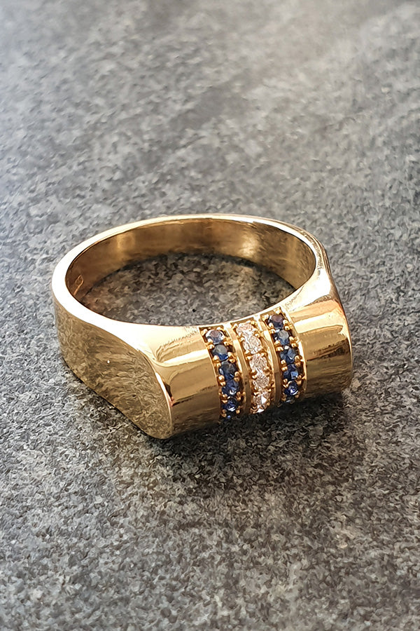 Sapphire and Diamond High Top Ring in 14 carat gold. Edge Only