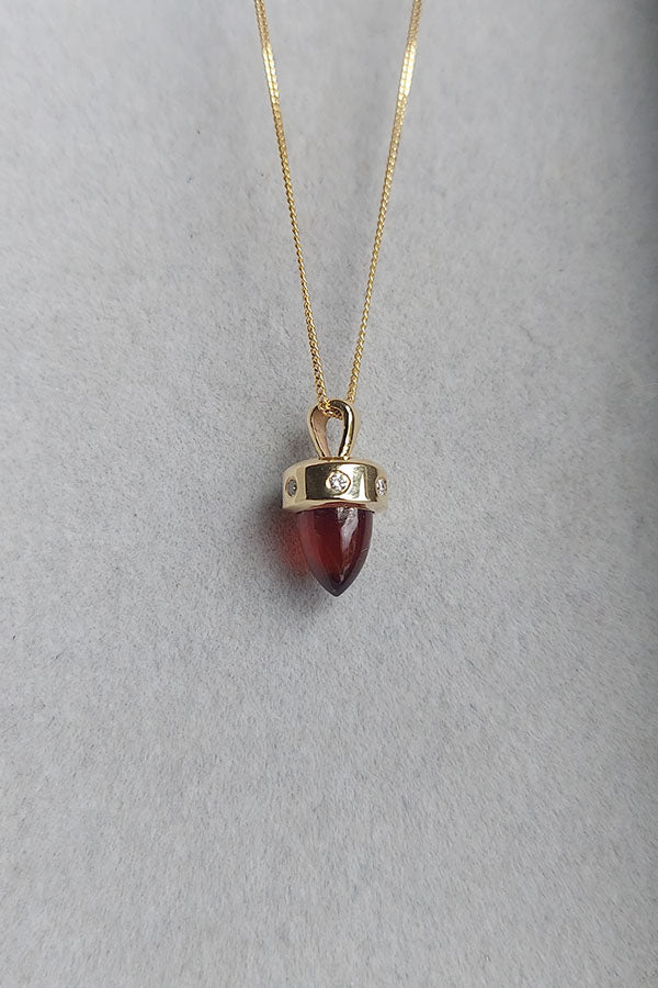 Edge Only 9ct gold Hessionite Garnet and Diamond Bullet Pendant side view. Sustainable recycled gold. 