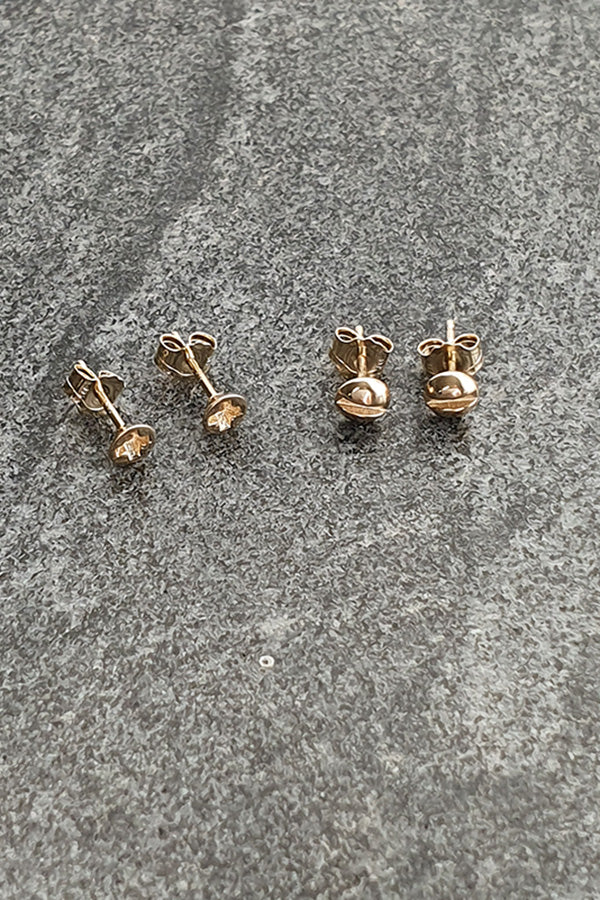 Edge Only mini Cross-head screw earrings and Mini Flat-head Screw Earrings in solid 100% recycled 14 carat gold 