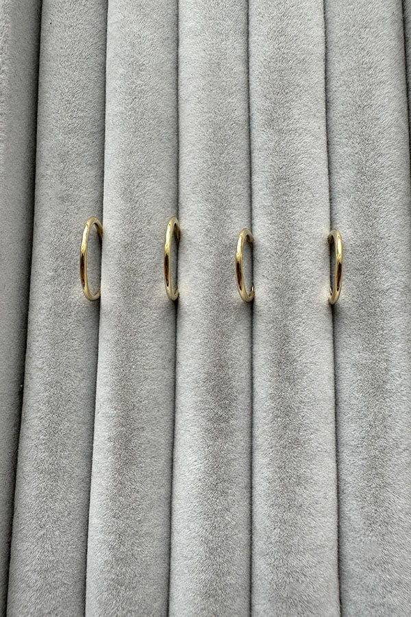 Edge Only 15mm and 13mm 14ct gold hoops in velvet tray