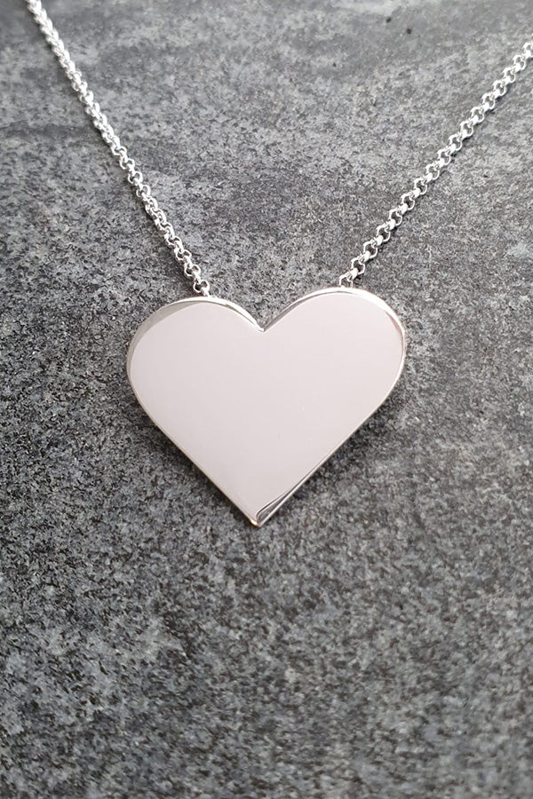 Edge_Only Heart Pendant XL in sterling silver on marble