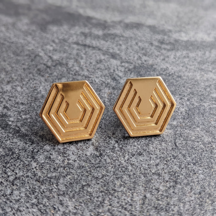 Edge Only Hexagon Earrings in 18ct gold vermeil on grey marble