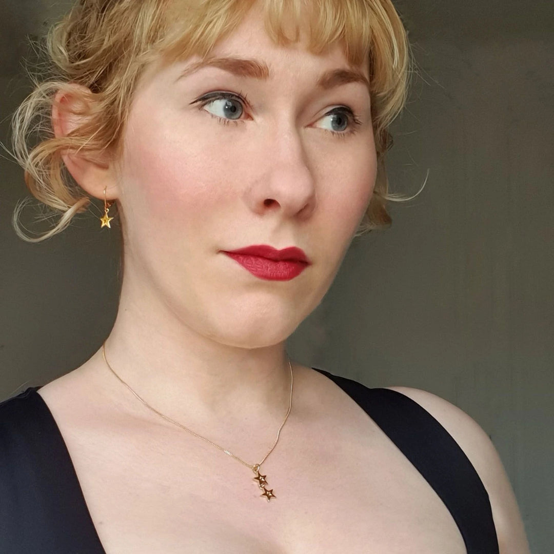 Modelled shot of Edge Only Mini Megastar two Star Pendant in 18ct Gold Vermeil