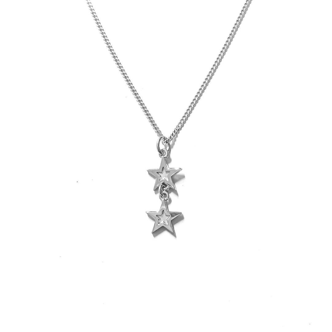 product shot of Edge Only Mini Megastar two Star Pendant in sterling silver
