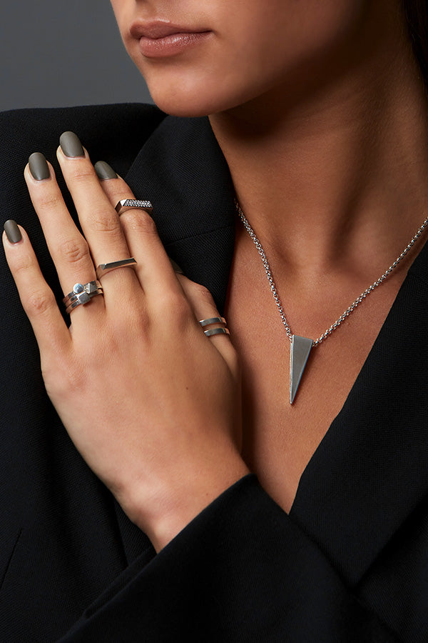 Edge Only Spike Pendant in sterling silver and various rings. 