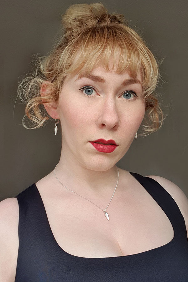 Edge Only Spiral Drop Earrings in recycled sterling silver. modelled with Spiral Drop Pendant