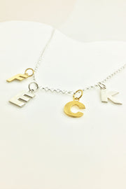 Edge Only Edge Only FECK Letters Necklace sterling silver