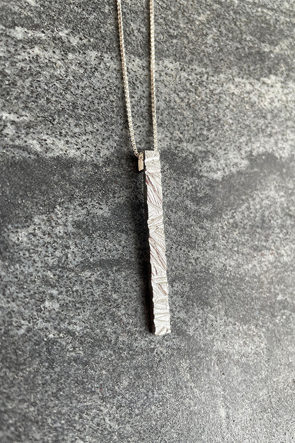 Edge Only Rugged Pendant in recycled sterling silver. Shown with  box chain