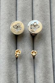 Edge Only Philips-head Screw Earrings in sterling silver above mini Cross-head screw earrings in solid 100% recycled 14 carat gold 
