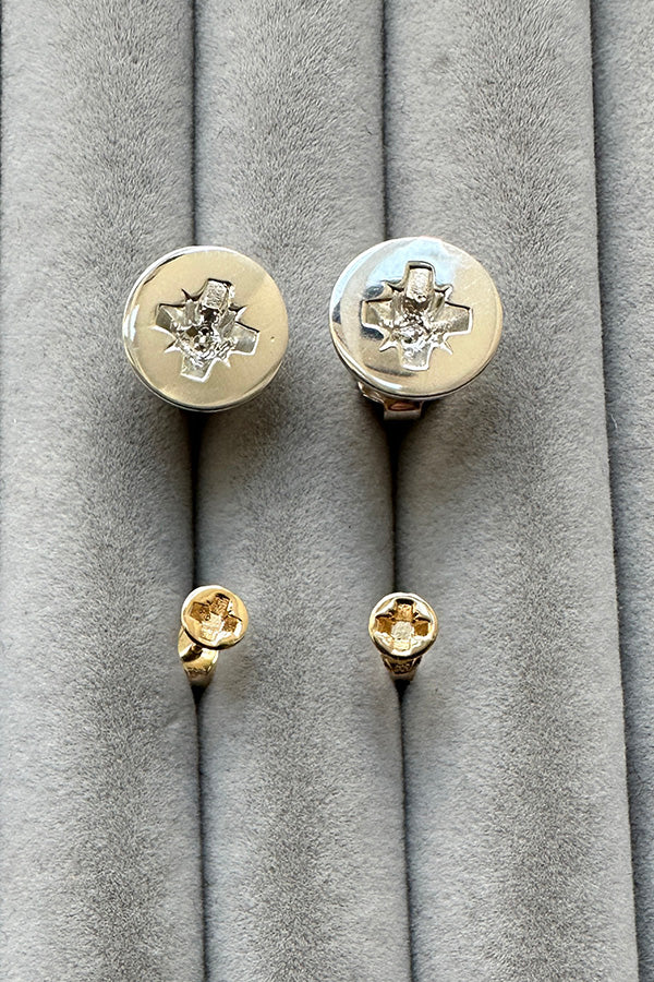 Edge Only Philips-head Screw Earrings in sterling silver above mini Cross-head screw earrings in solid 100% recycled 14 carat gold 