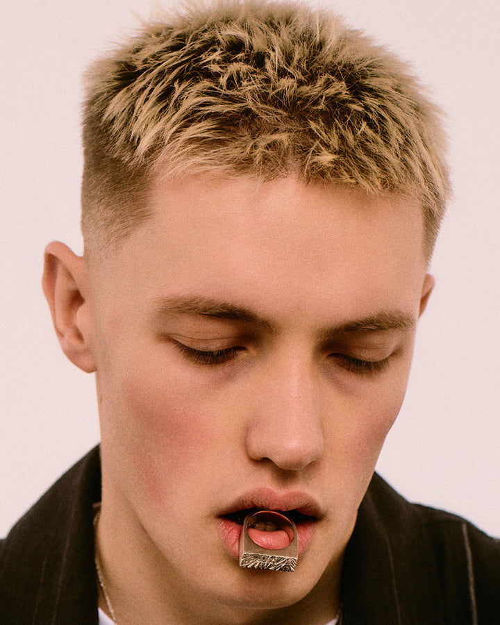 Edge Only Rugged Ring Sterling silver in models mouth. Declan Kelly men&