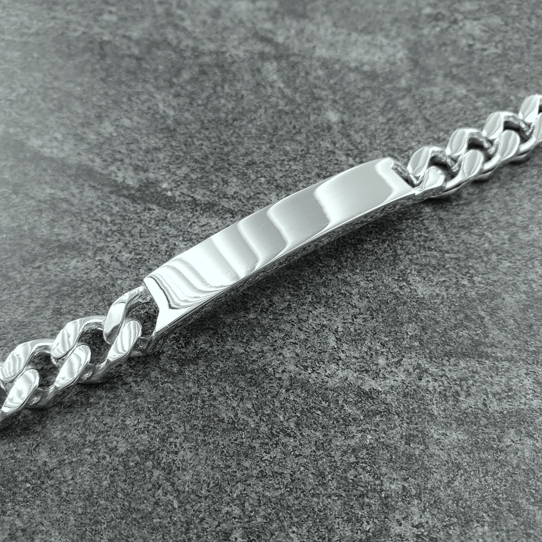 Edge Only Heavy Curb ID Bracelet in sterling silver on marble